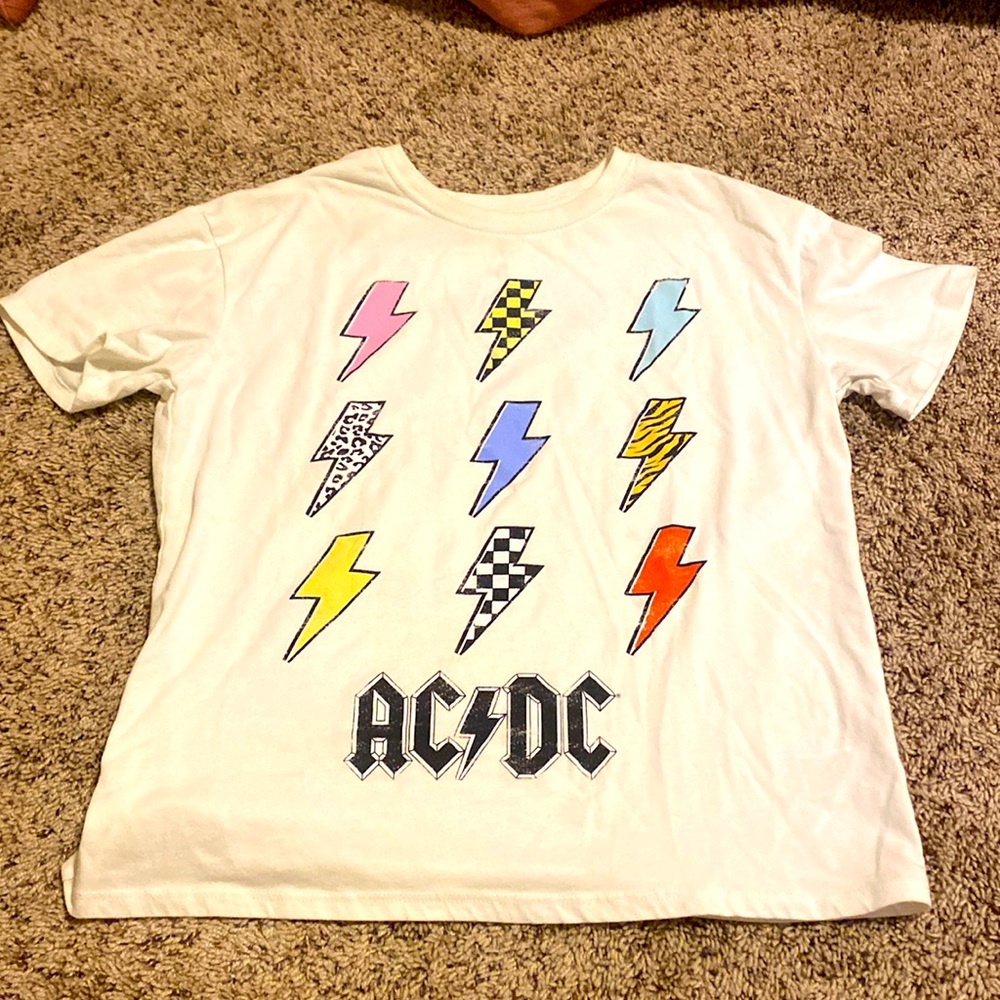A white AC/DC lightning bolt shirt